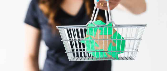 woman with shopping basket with sustainable brand